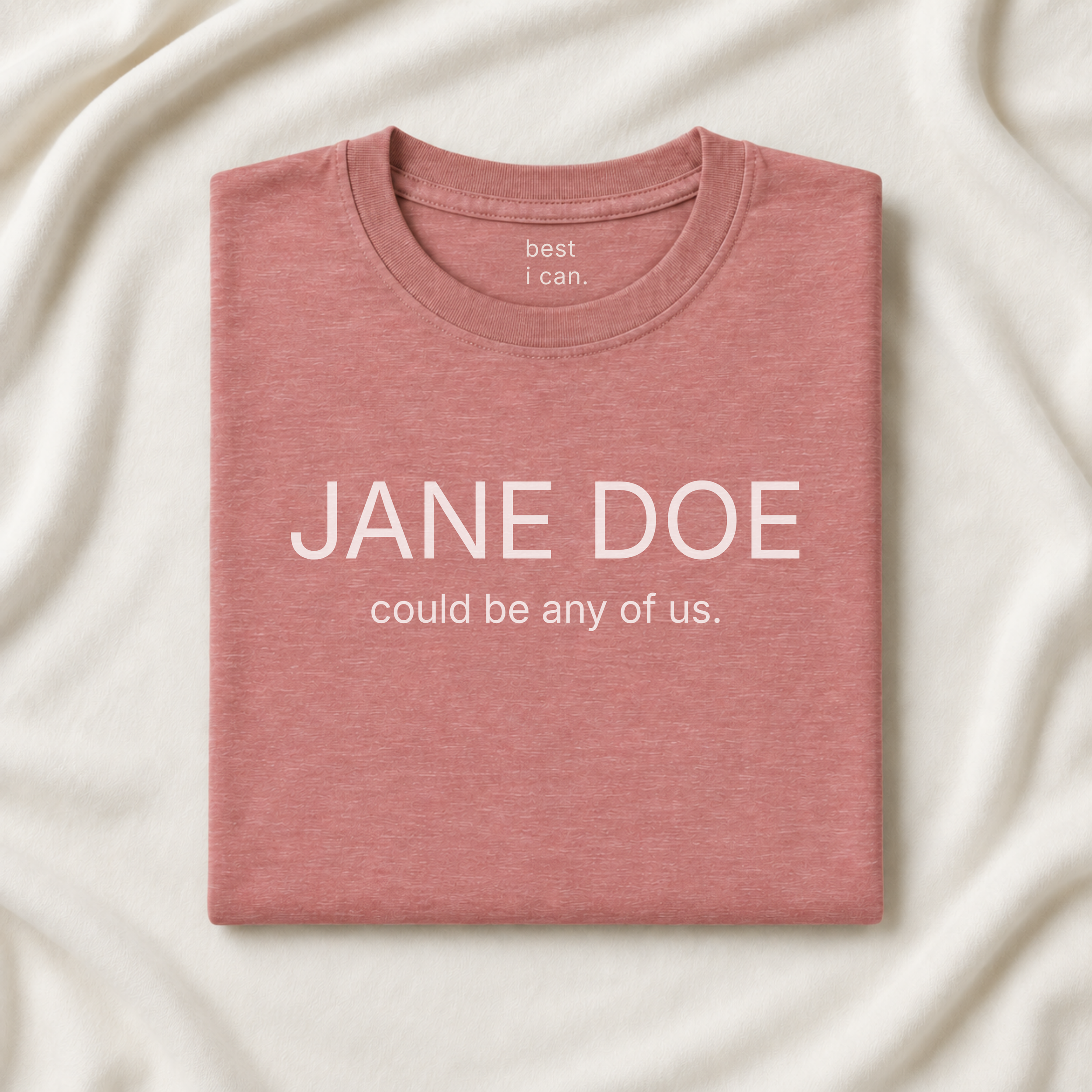 jane doe could be any of us. t-shirt in heather mauve, folded