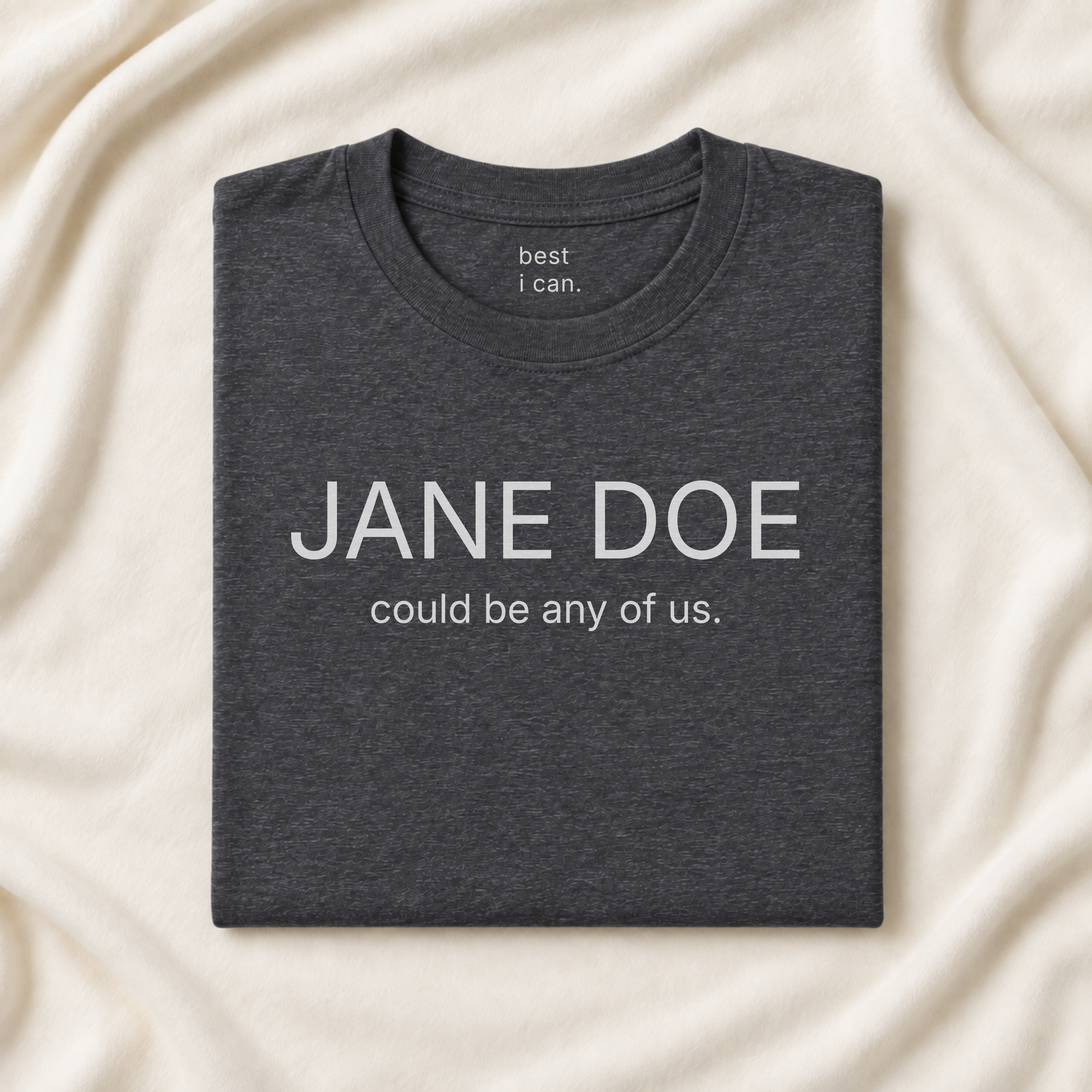 jane doe could be any of us. t-shirt in dark grey heather, folded