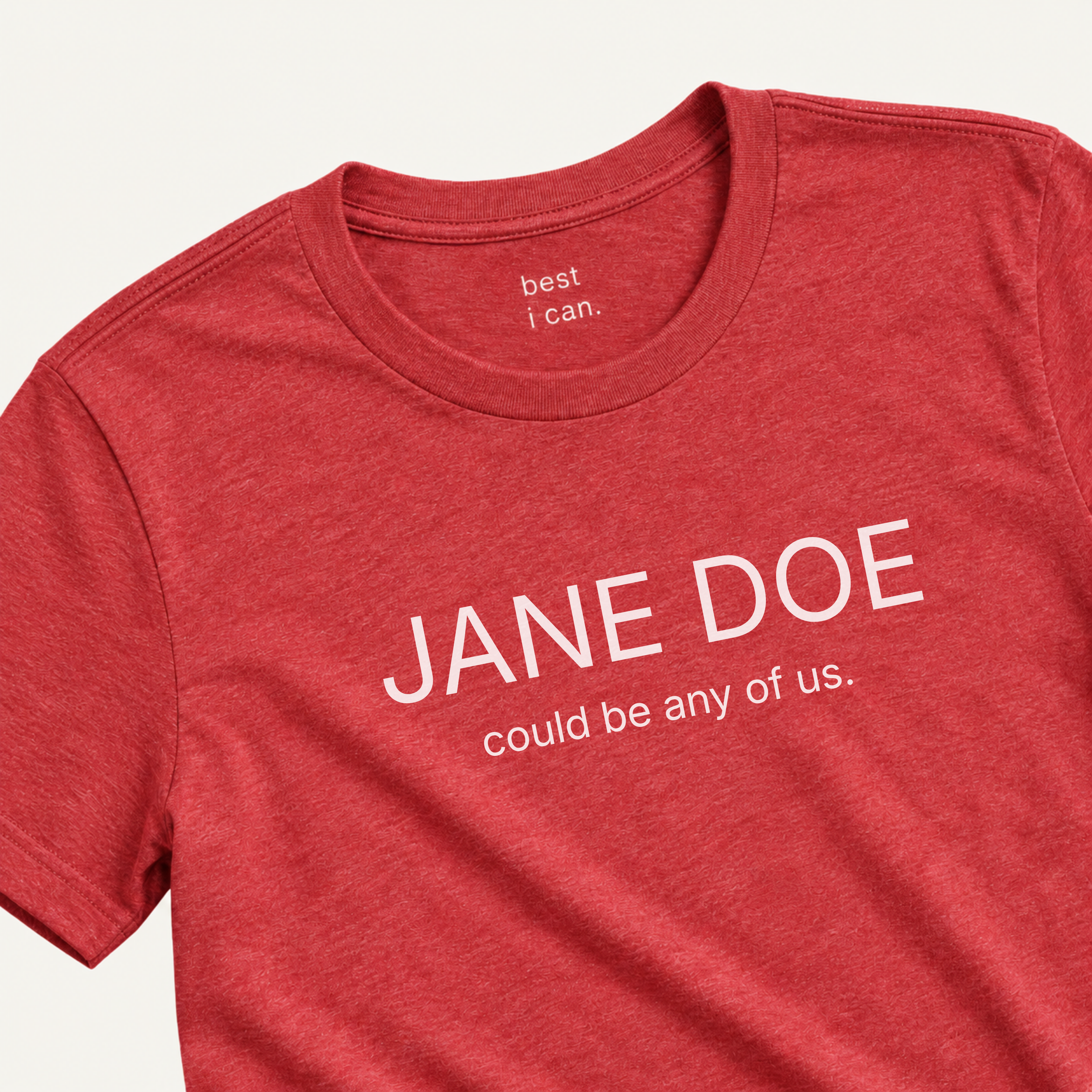 red jane doe could be any of us. t-shirt, laid flat
