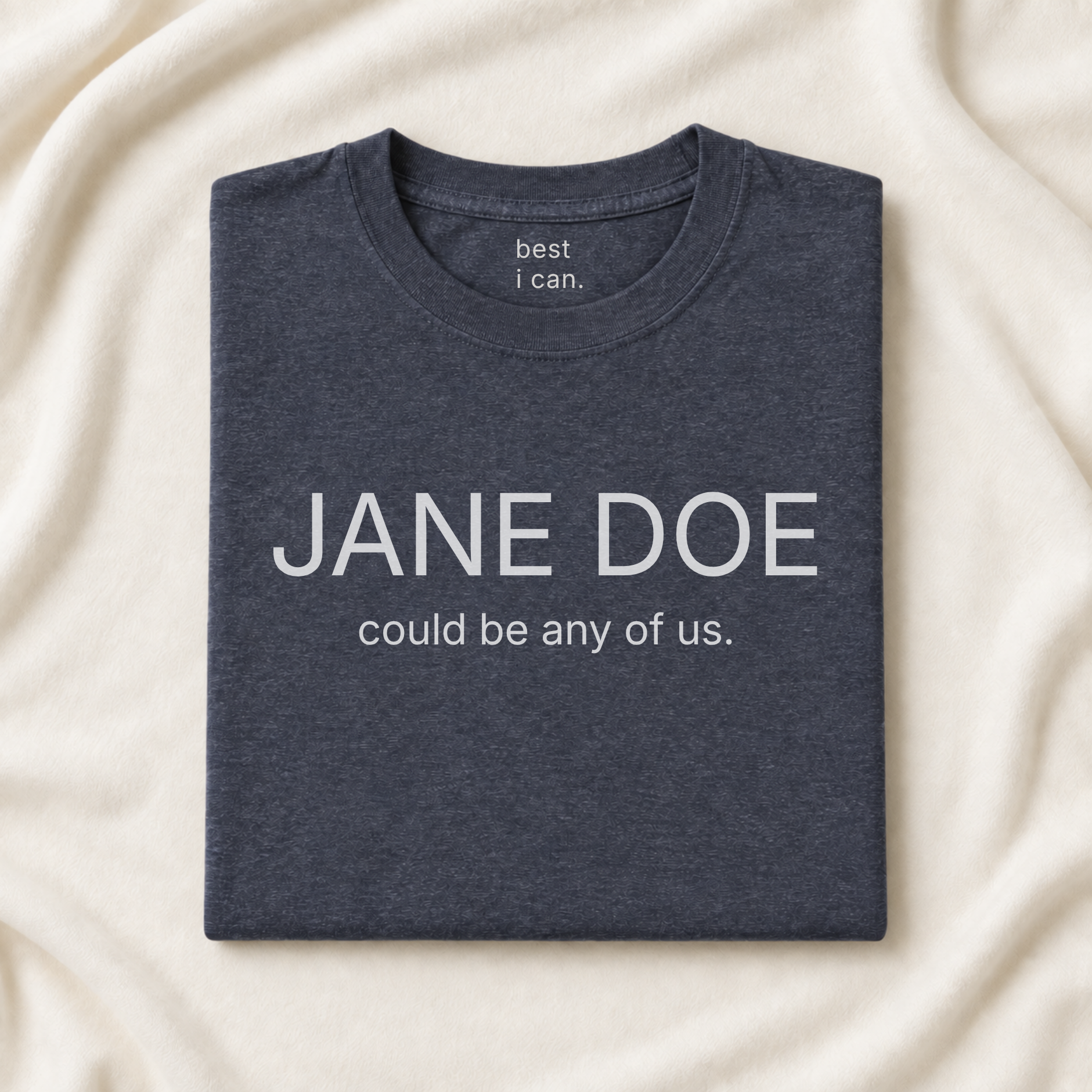 jane doe could be any of us. t-shirt in heather navy, folded