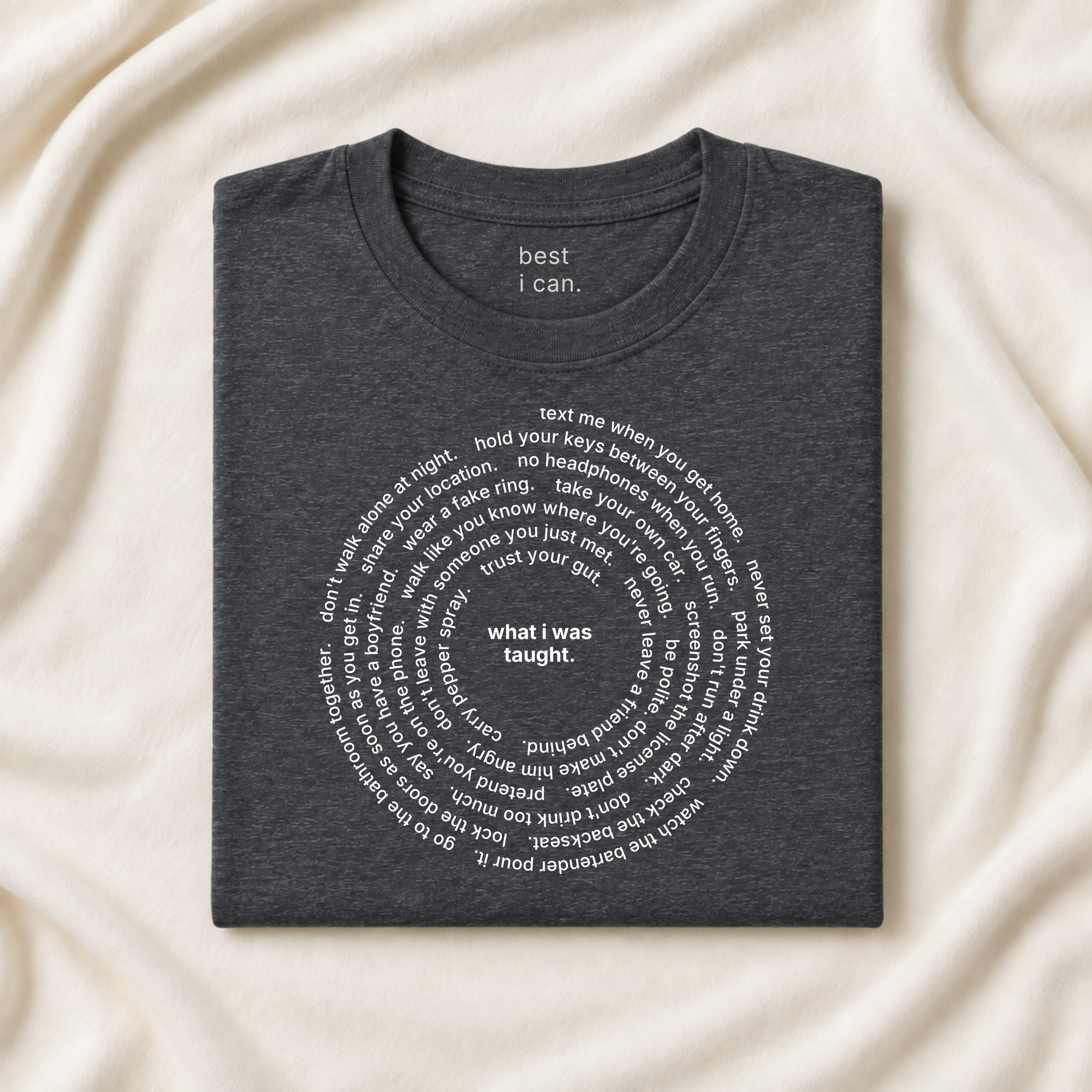 what i was taught. t-shirt in dark grey heather, folded