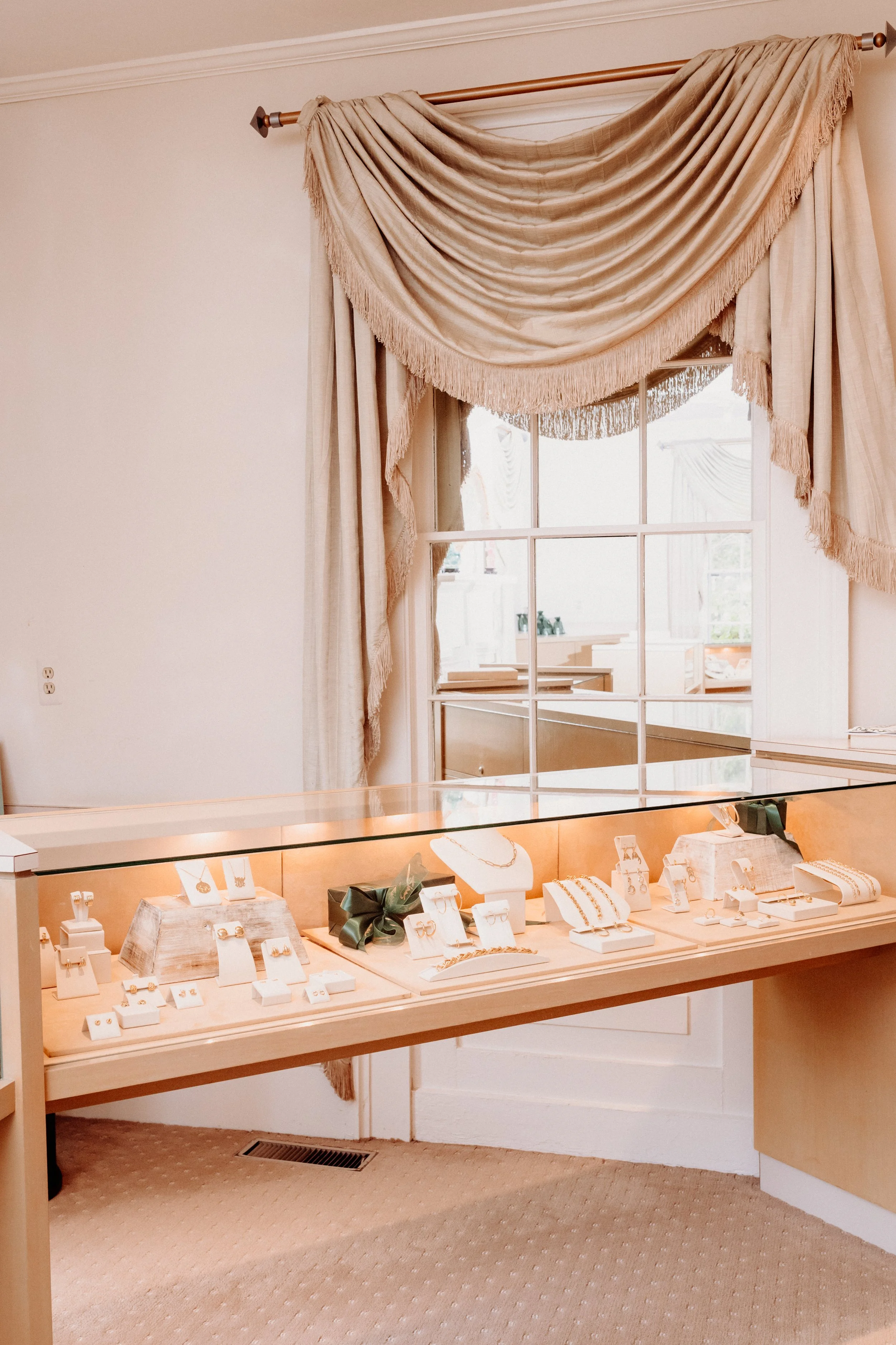 case of jewelry with curtain and mirror