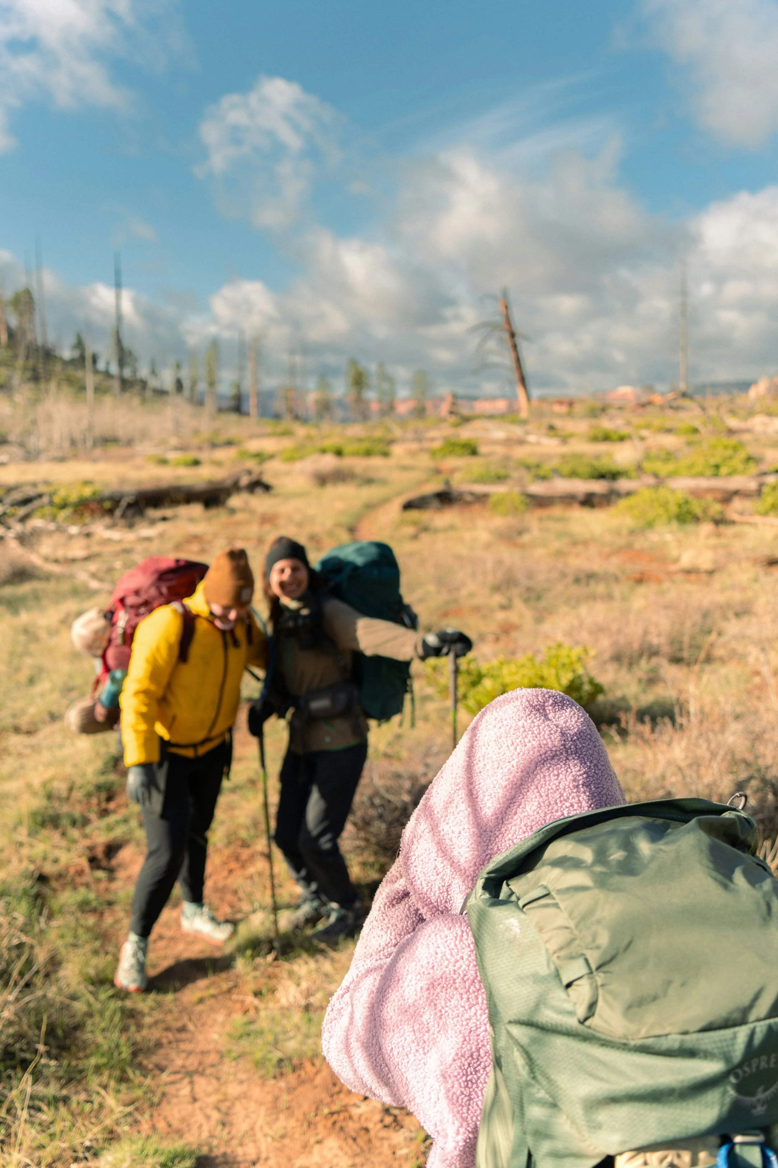Two women being photographer during a hike