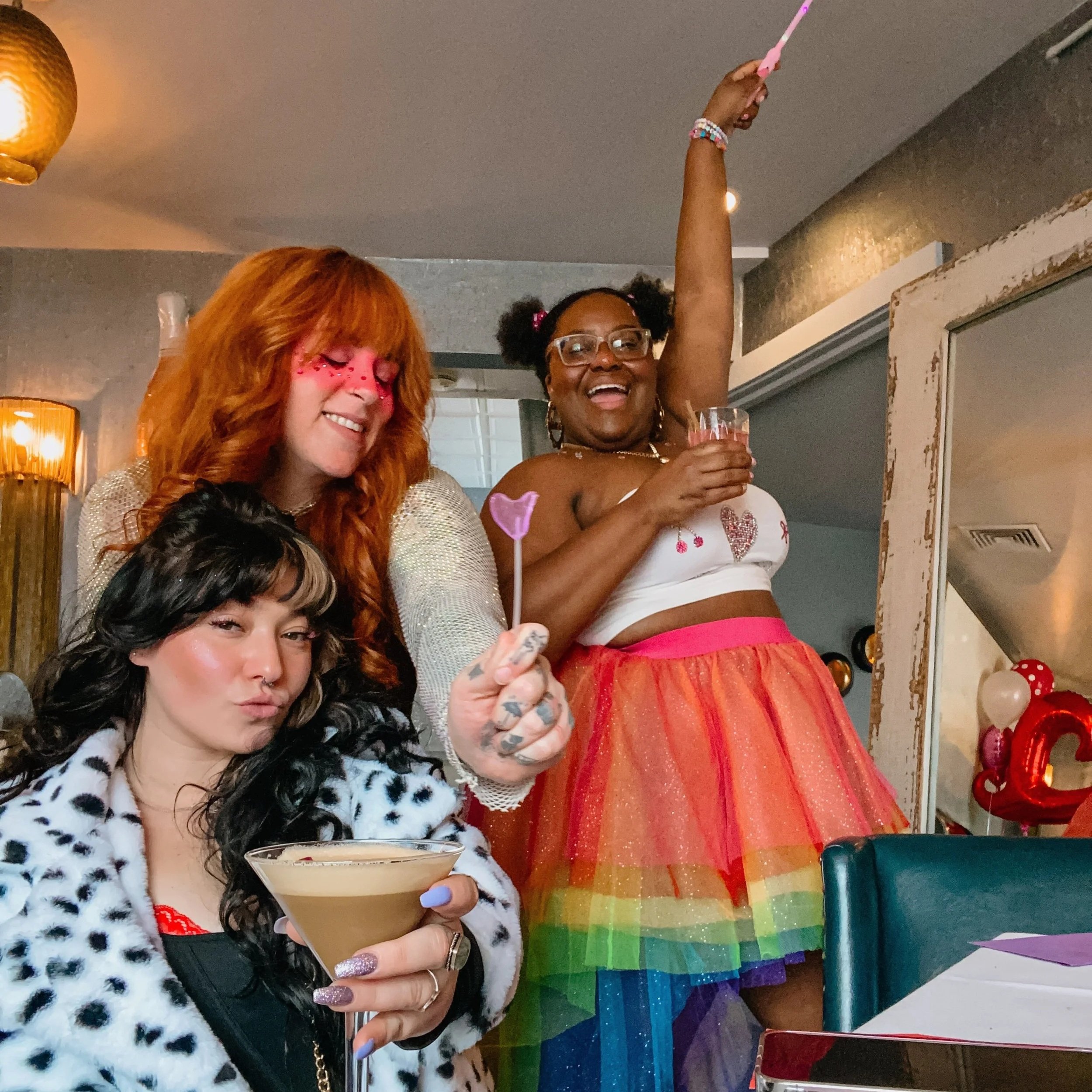 Group of women connecting, having fun, laughing and wearing costumes