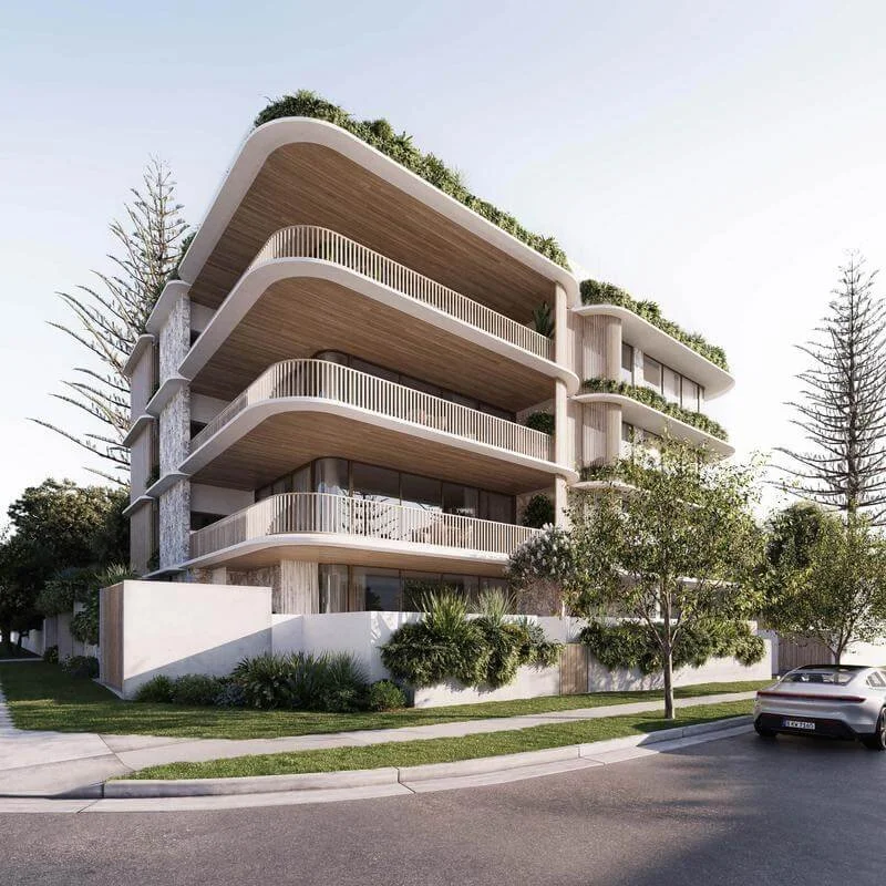 Modern multi-story residential building with curved balconies and rooftop greenery, surrounded by trees and a parked car