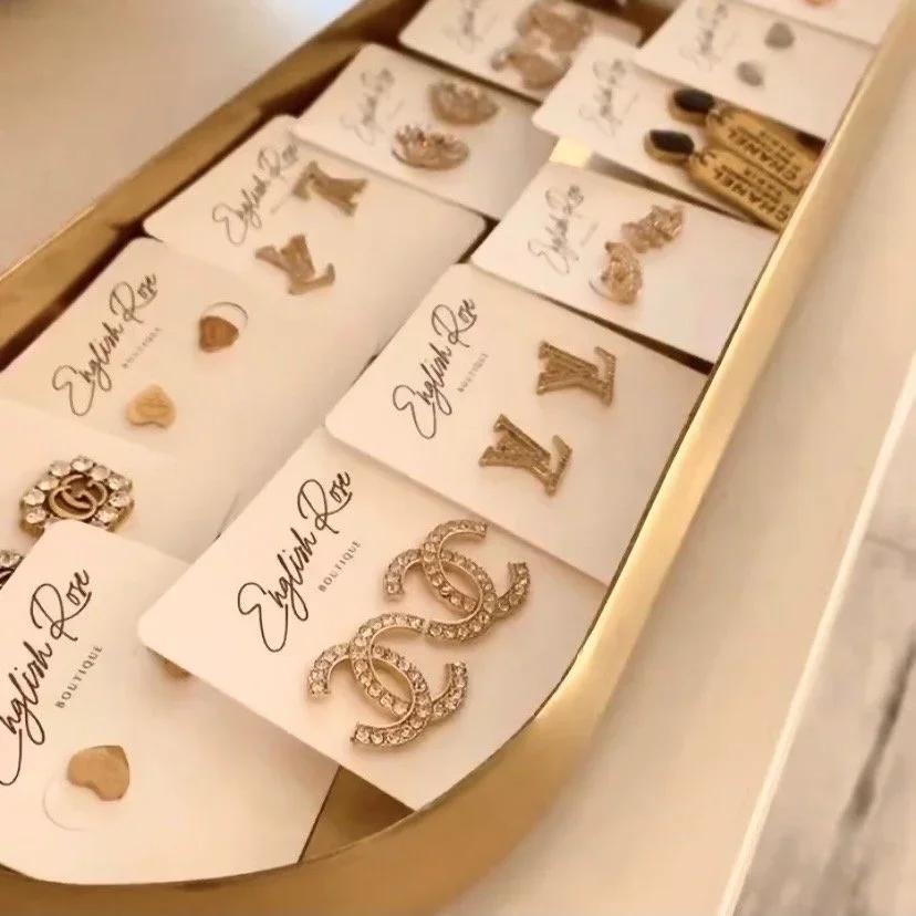 English Rose boutique retail merchandising featuring fashion accessories and curated jewelry displays