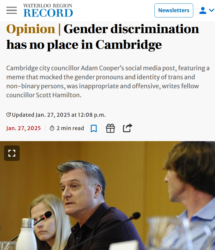 Cambridge city council meeting with three people, one speaking into a microphone, with a wooden panel background.