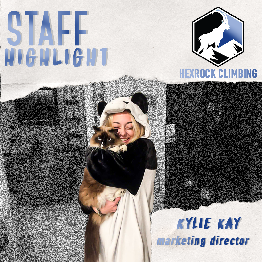 A woman dressed in a panda costume is holding a fluffy cat and smiling in front of a black and white background with a logo of a mountain goat and the words 'Hexrock Climbing.' The image includes text highlighting Kylie Kay, marketing director.