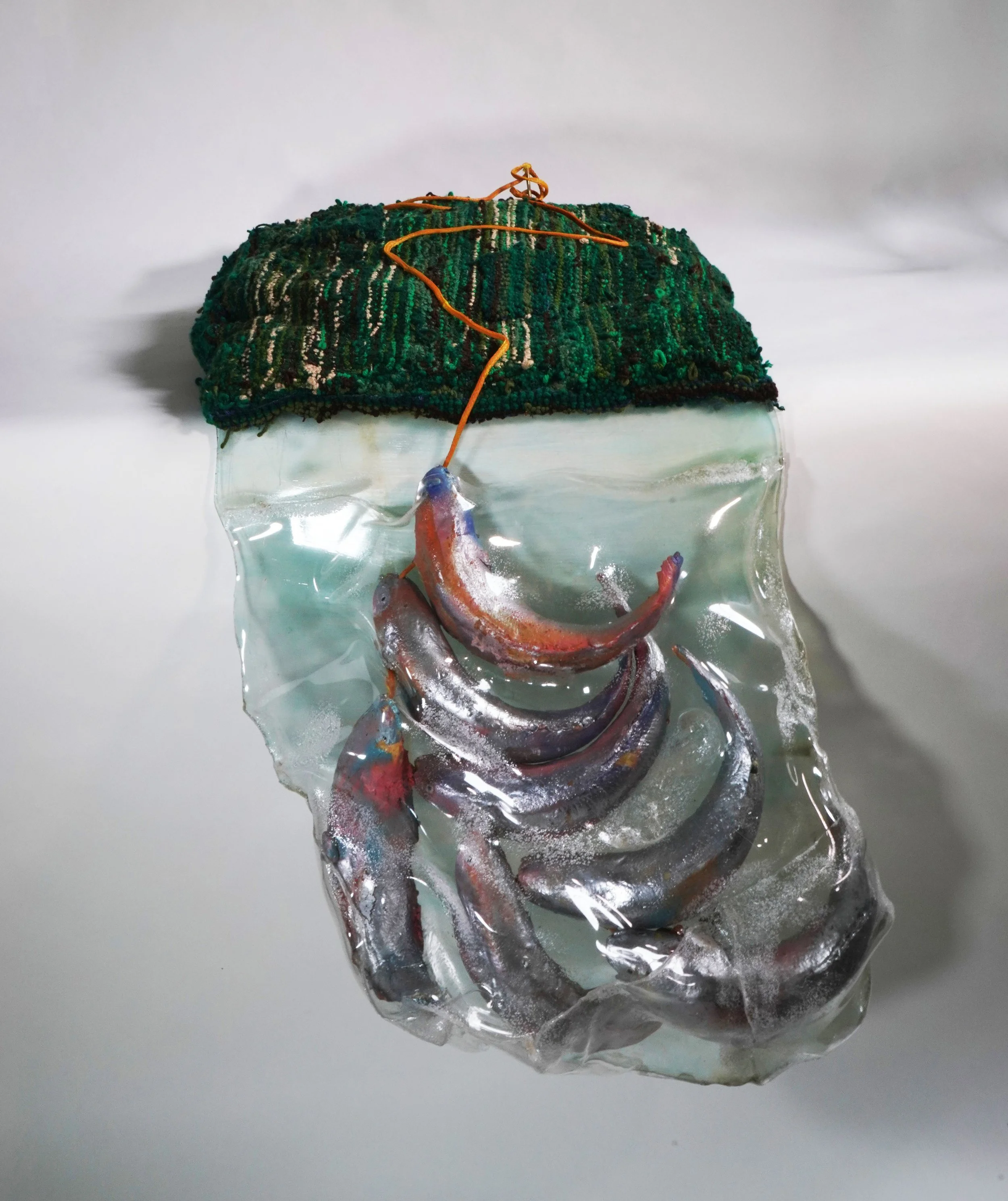 My Grandmothers Dream Catch II, 40" x 25" x 29.5", plexiglass, spray foam, tufted yarn, fish stringer, 2022