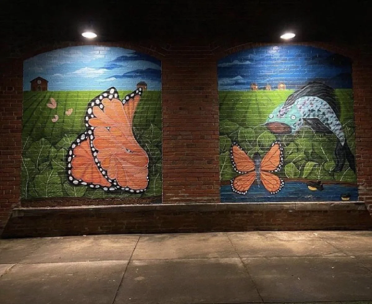 Catfish and Collards, exterior paint, Ayden, NC, 2022. Collaboration with Raymond Henderson, Rakia Jackson, and volunteer Takia Williams, 