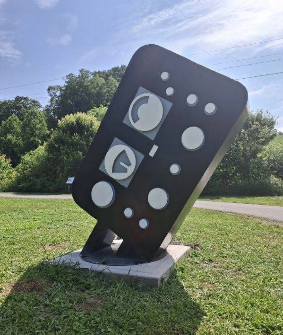 Switch, Steel, vinyl, exterior enamel, Manufacturing Art Park, Mars Hill, NC, 2025. Collaboration with Thaddeus Prevette. 
Permanent installation.