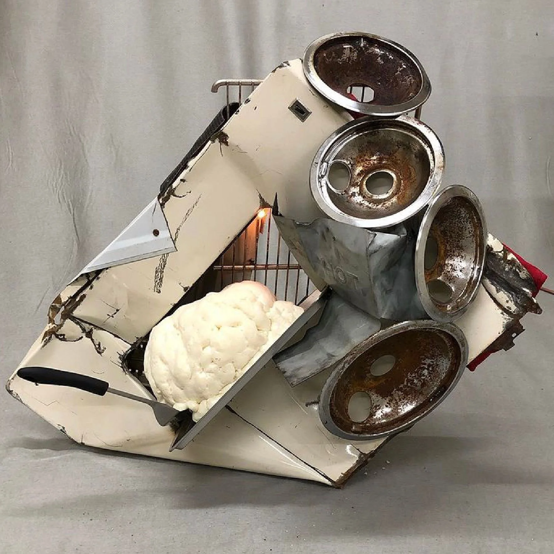 In the Kitchen, 29" x 29" x 13", repurposed metal, kitchen items, spray foam, light, 2020