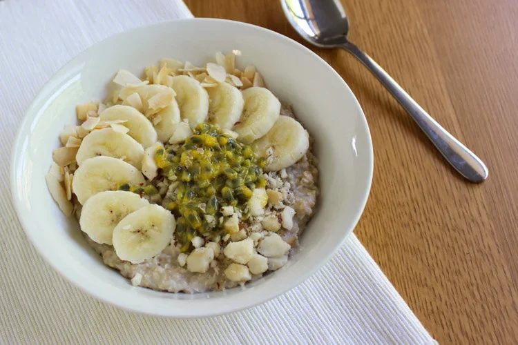 Low FODMAP Tropical Porridge (with banana, passionfruit, coconut and Brazil nuts)