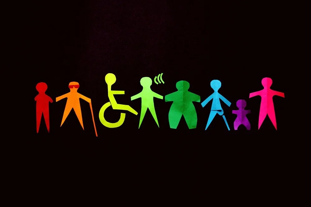 Rainbow paper people cutouts