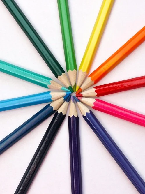 Rainbow colored pencils in a circle