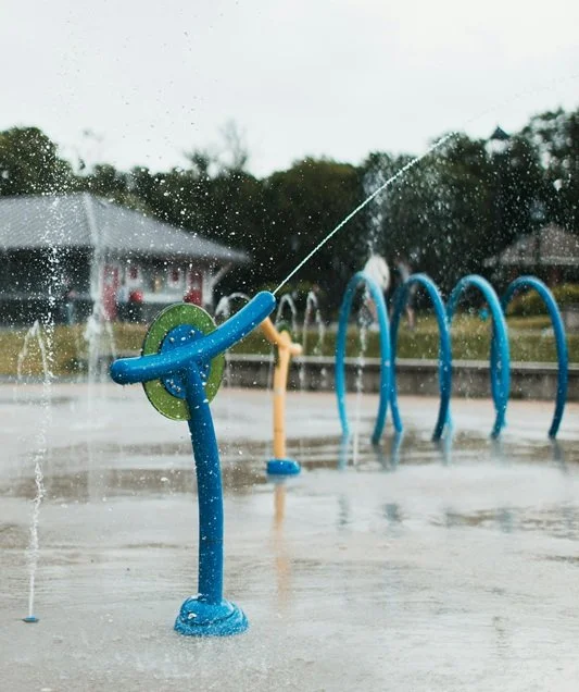 Water spraying at a splash pad