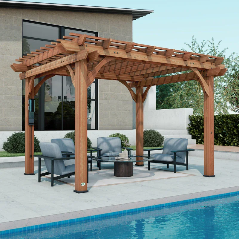 A wooden pergola with seating area and a small round table next to a swimming pool.
