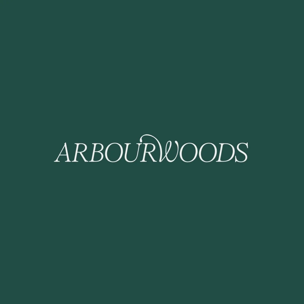 ArbourWoods logo with white text on a dark green background