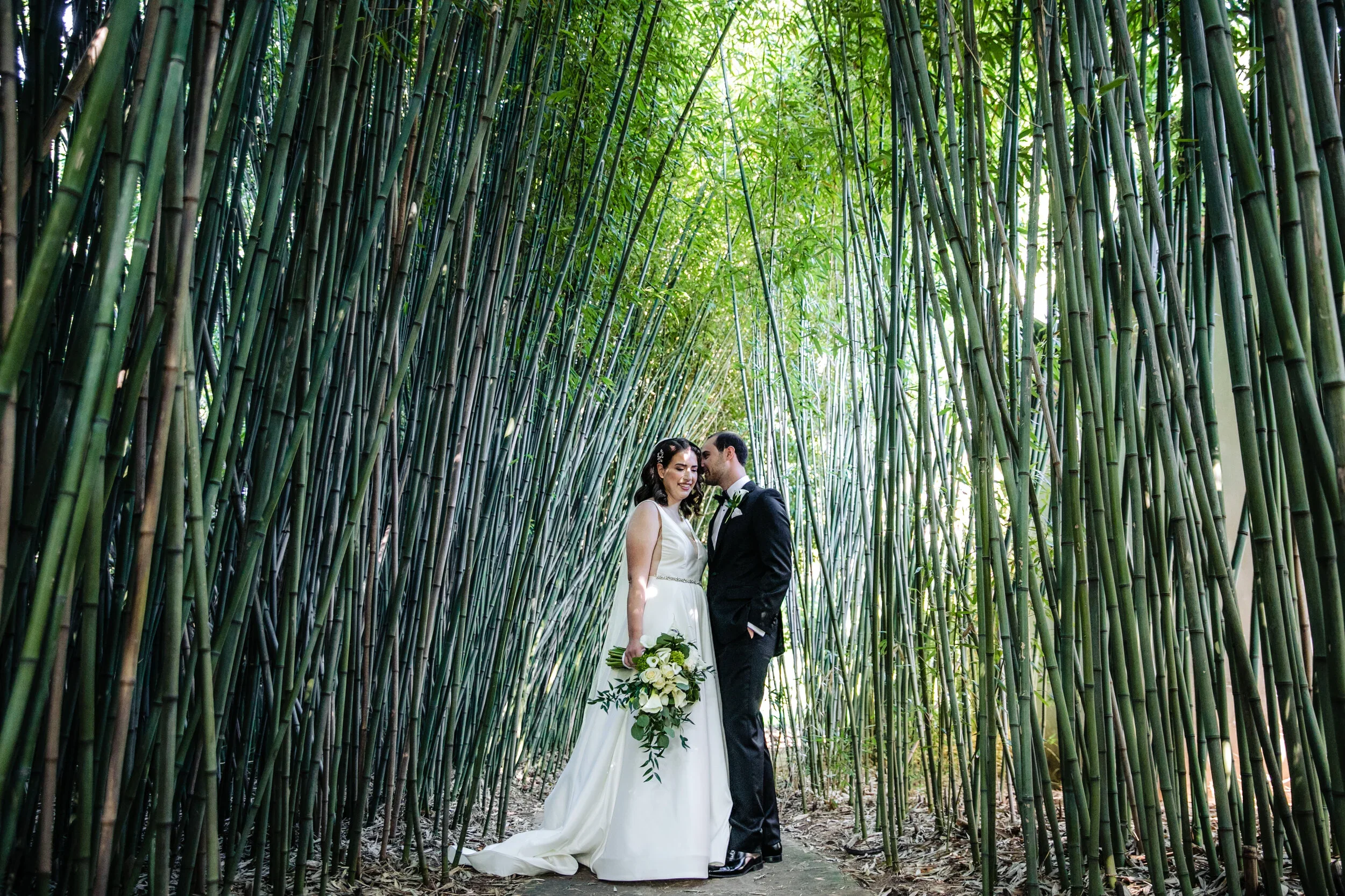 Laurie’s customers, Evan and Kade, running down a mountain after getting married. 