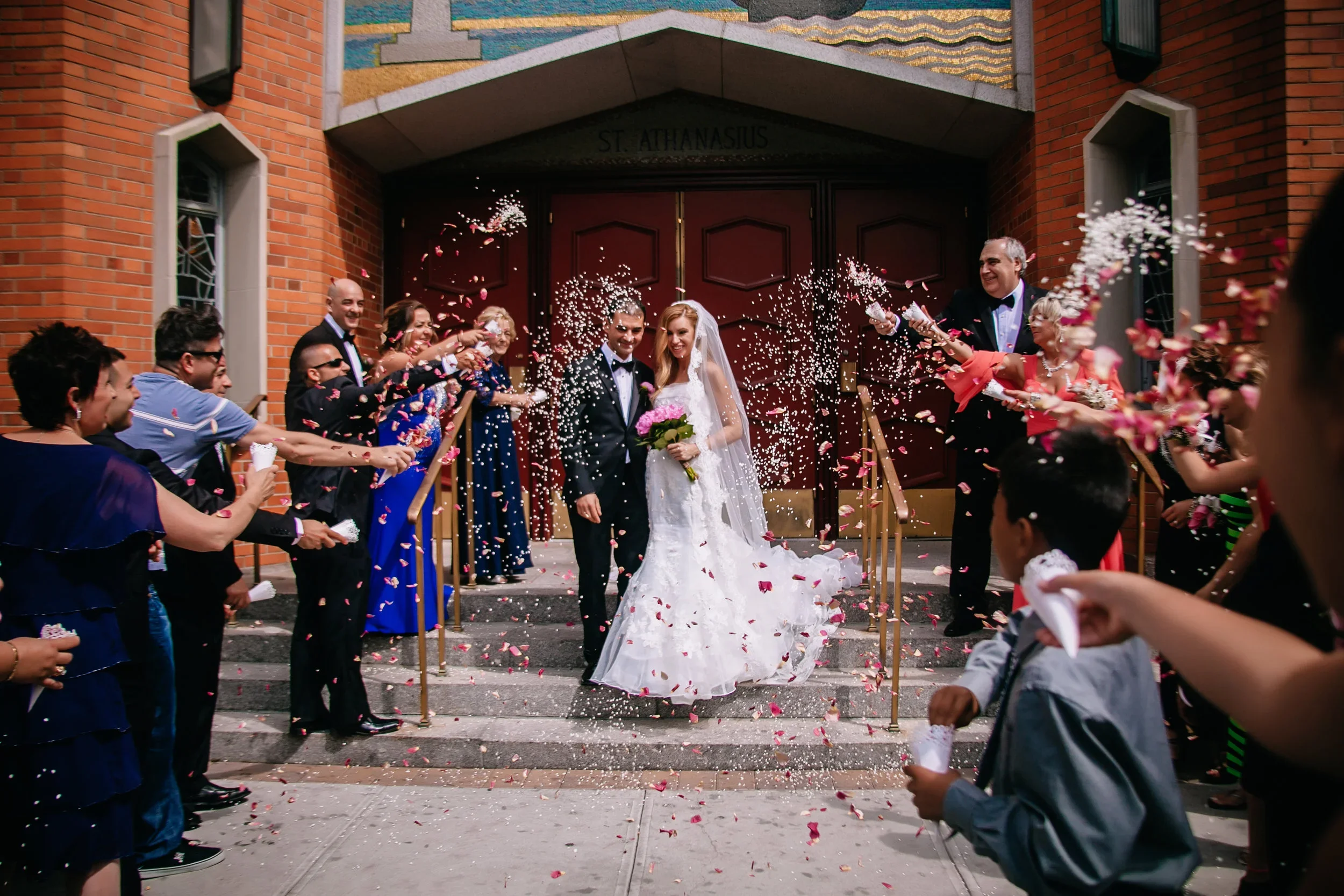 Laurie’s customers, Larissa and Emmett, just married walking off the aisle together.