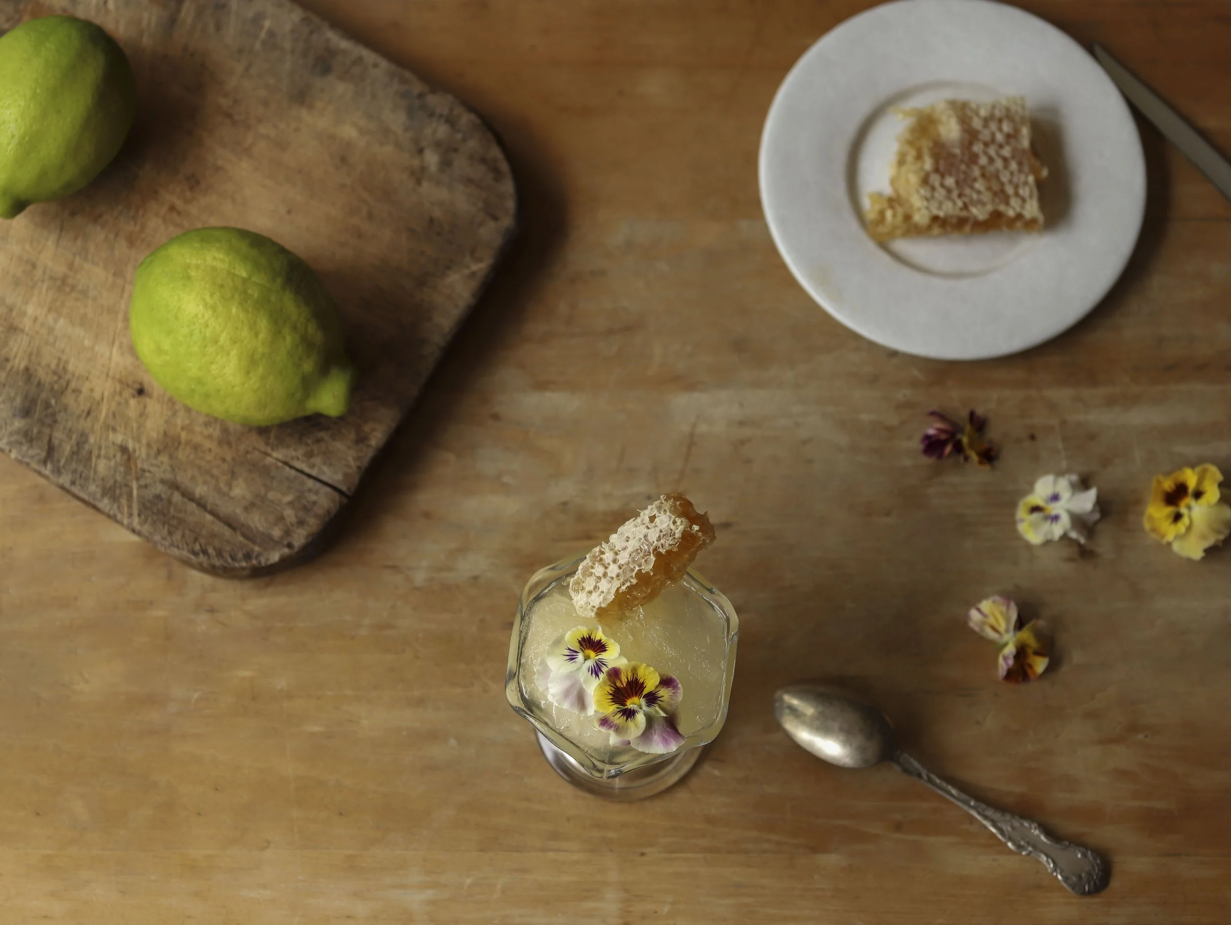 Green Meyer Lemon Granita with a Superbloom Honeycomb and Viola Flowers