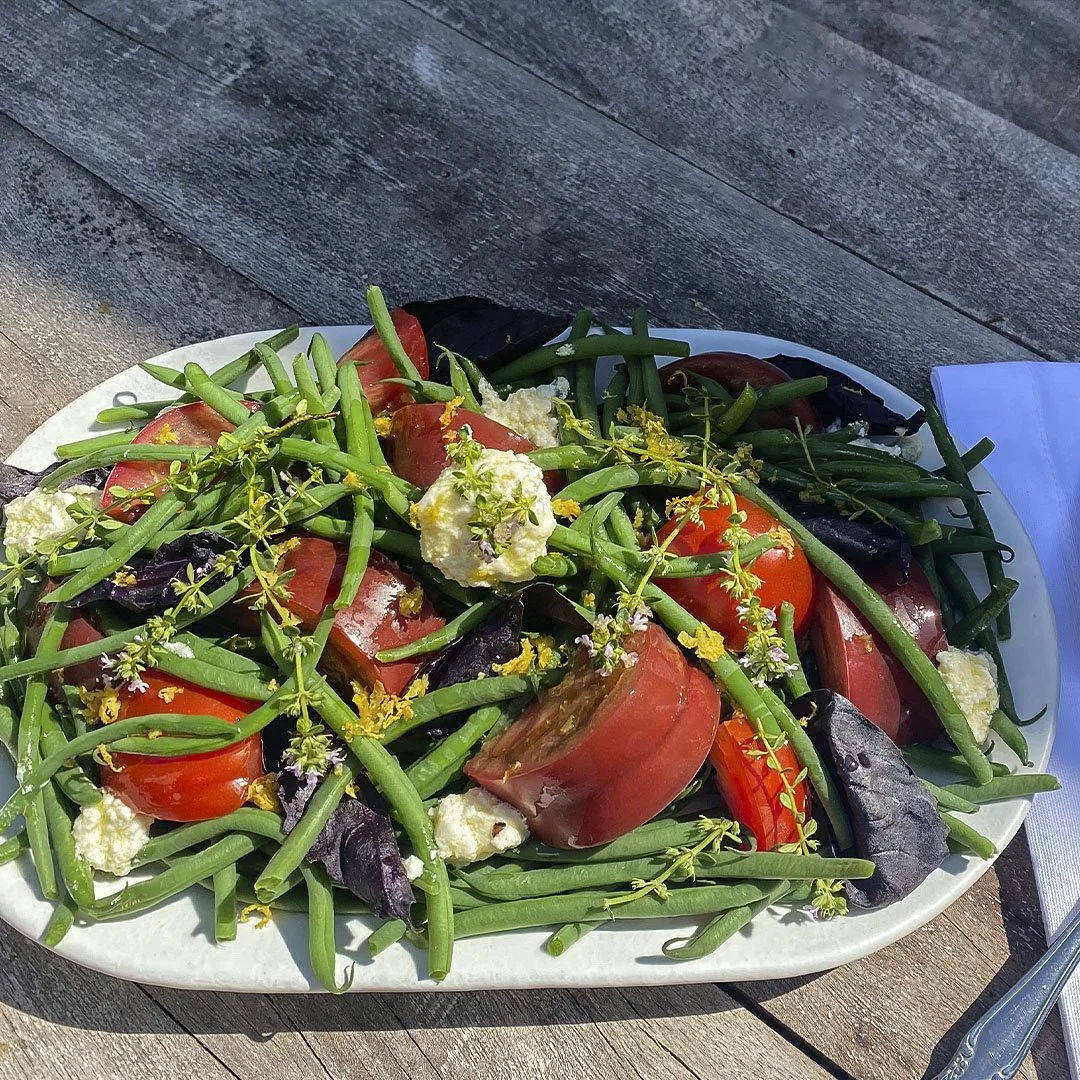 Haricot Verts, Heirloom Tomatoes, Purple Basil, and Lemon Zest with Fromage Blanc and a Lemon Honey Dressing