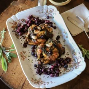 Roast Cornish Hens and Thomcord Grapes with Bacon, Garlic, Thyme, Parsley, Sage, Lemon and Honey