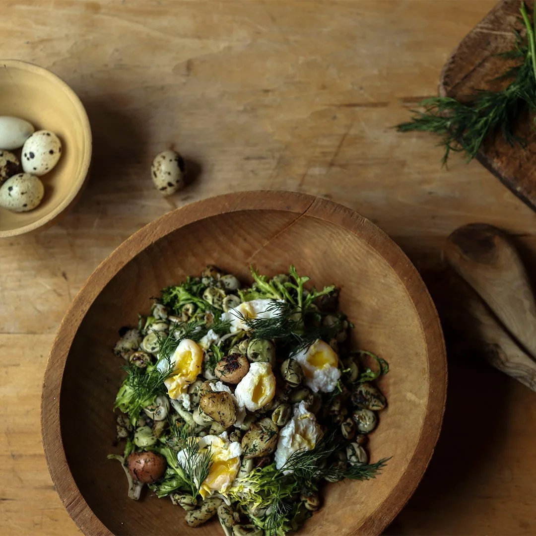 Wilted Frisee Salad with Fava Beans, Potatoes, Dill, and Quail Eggs