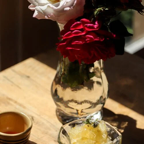 Meyer Lemon Granita with Rose Infused Honey and Sweet Alyssum