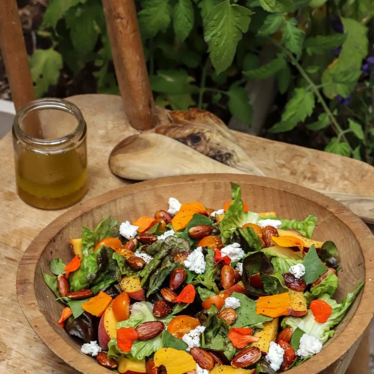 Peach, Tomato, and Greens Salad with Sorrel, Nasturtium, Almonds, Goat Cheese, and a Honey-Lemon Dressing