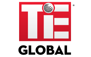 The TiE logo with a red background, large white letters spelling 'TIE', and a small globe icon above the 'I'.