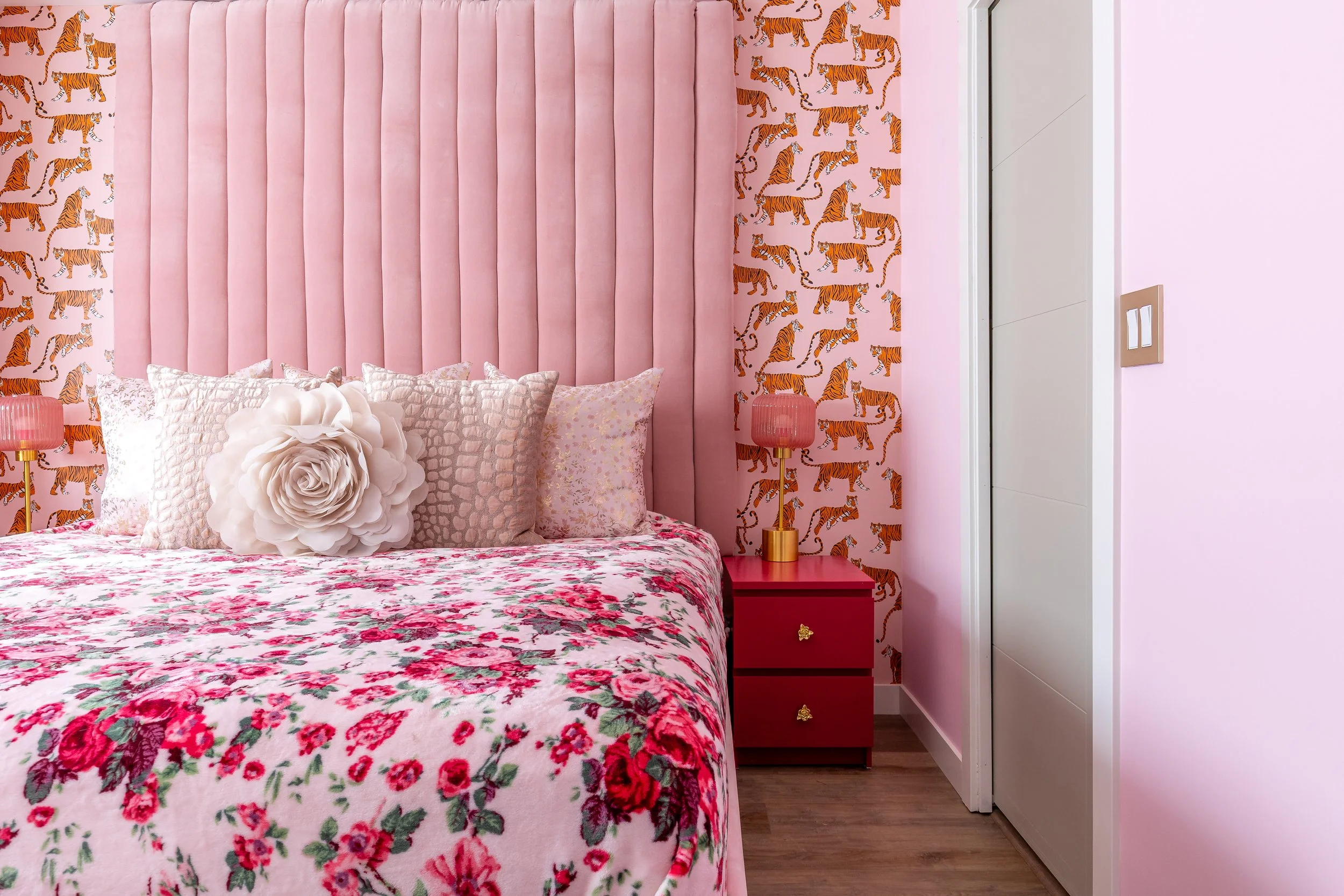 a pink bedroom for adults is shown - featuring all pink bedroom with maximalist design qualities
