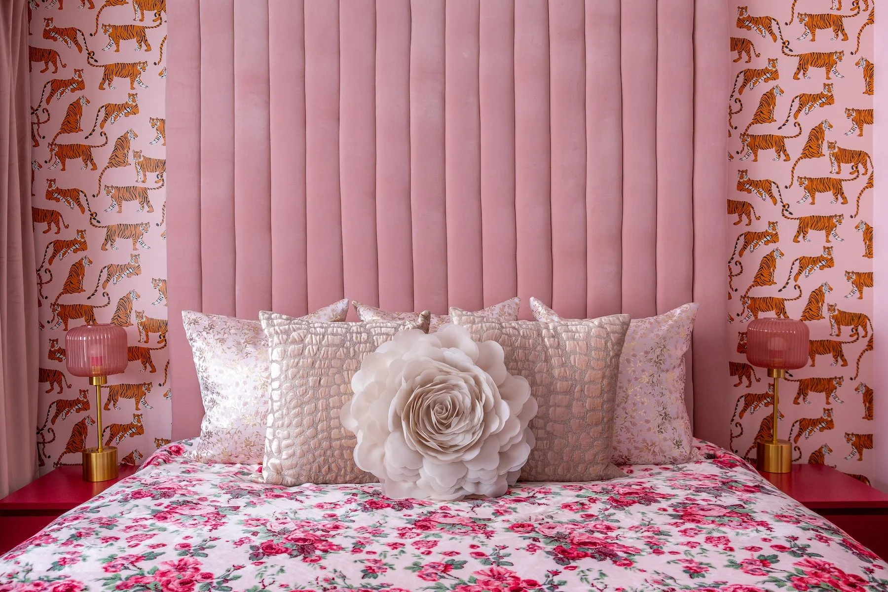 this photo shows a custom channel tufted headboard made custom for this client's pink bedroom that shows some tips for how to make a pink bedroom look grown up
