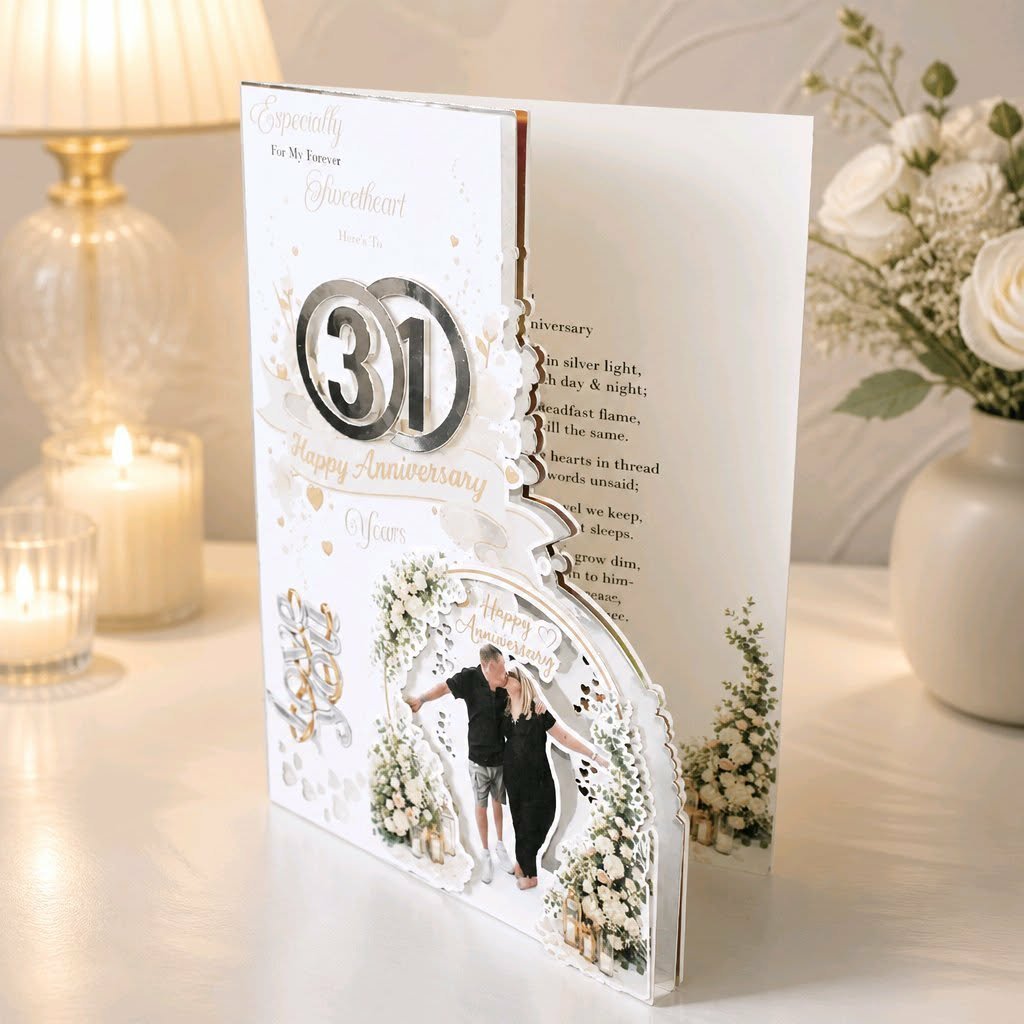 The floral arch extends beyond trim edge for the intended “flowing off the edge” effect. Stunning holographic liners sit behind the front cover reflecting through the cutout hearts. Option to replace the couple silhouette with a custom silhouette pro