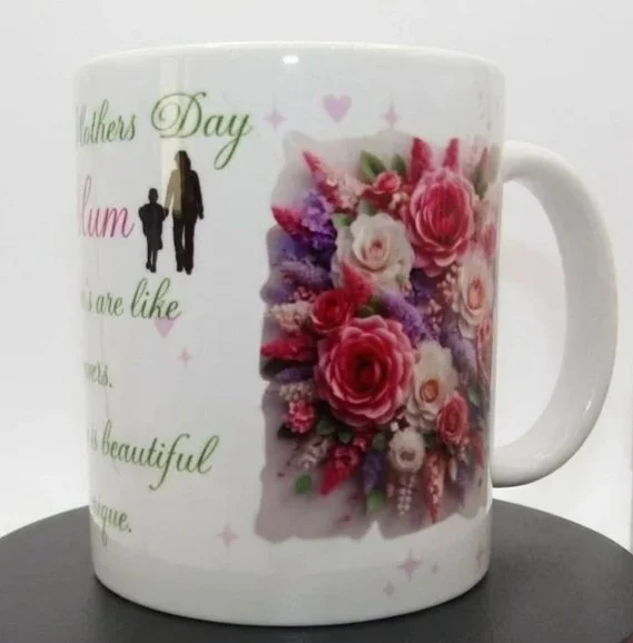 Floral print adorns the mug with a mother and child motif. 