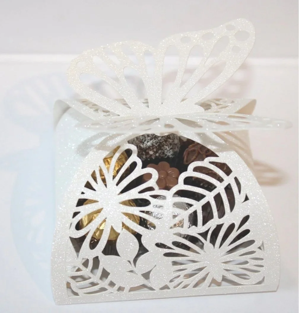 They’re not just boxes; they’re a little piece of magic that adds elegance to your special day.
The wings close the box with such grace, making them not just a favour box, but a beautiful keepsake. (Chocolates Not Included)