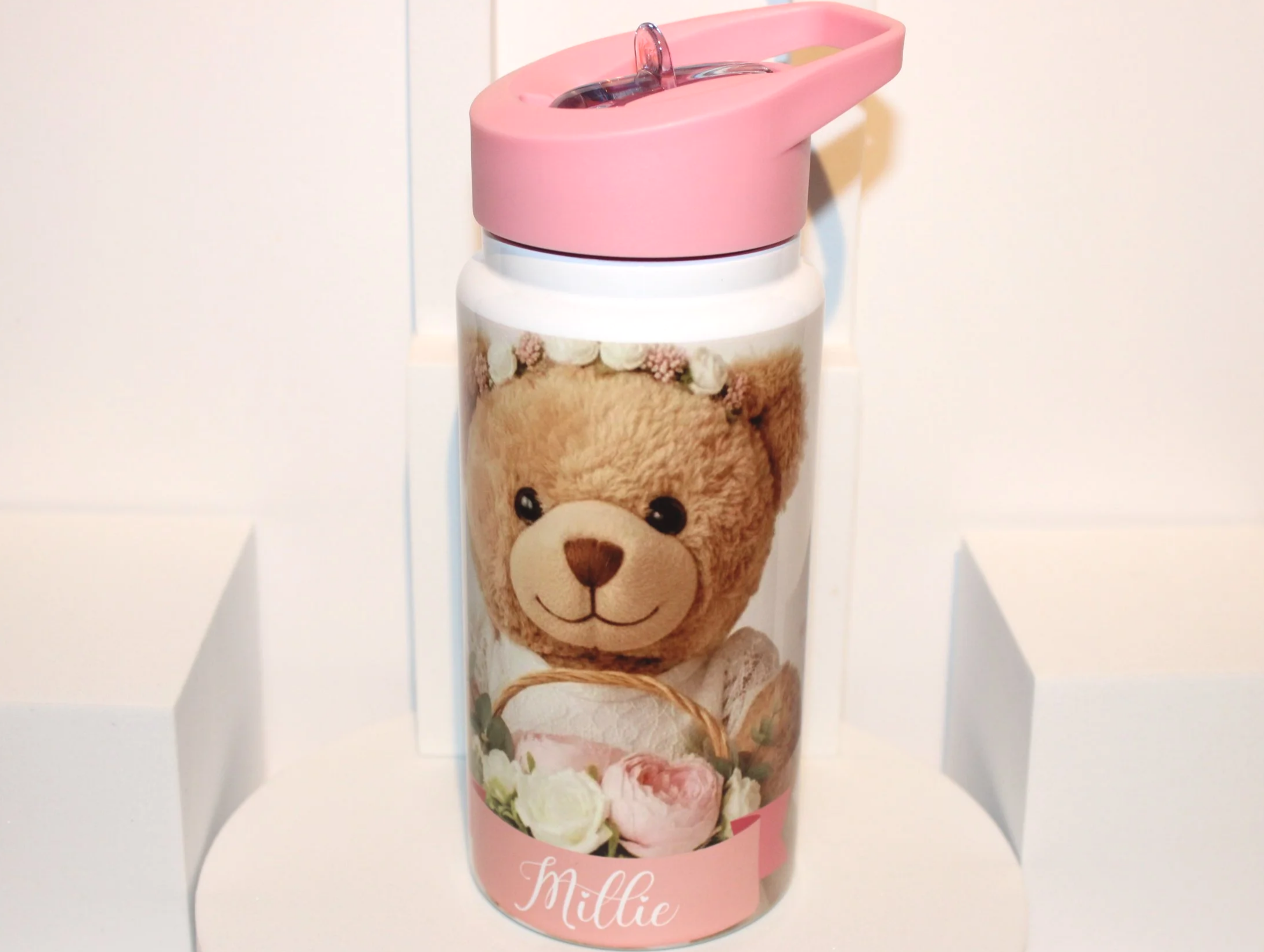 Flower Girl Water Bottle!
Personalized water bottle featuring a sweet message from the bride and groom and a printed image of a flower girl teddy. Perfect as a thoughtful keepsake and practical for young attendants at weddings. #0088
