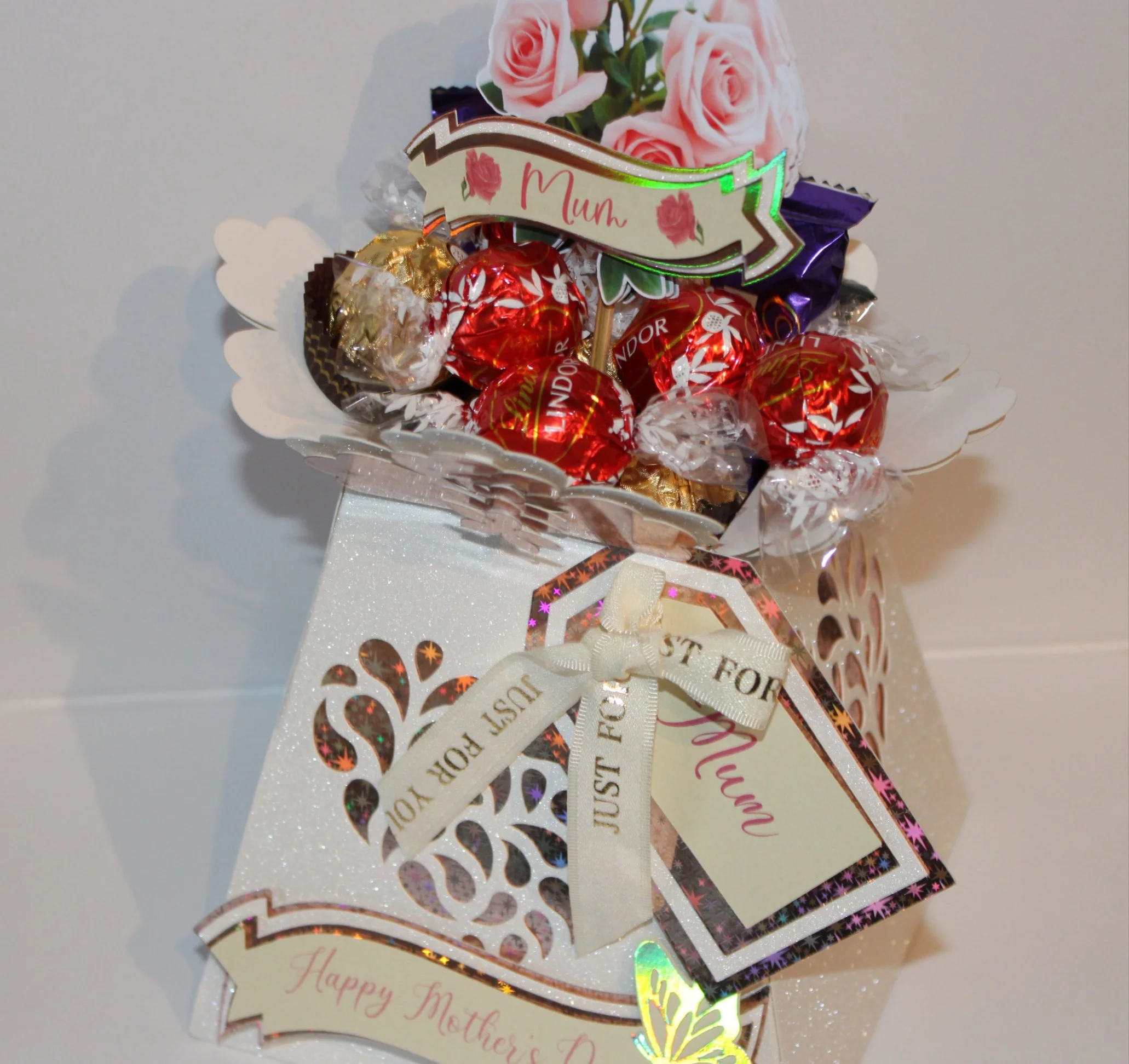 (NEW) Mother’s Day vase filled with your favourite sweet treats — a delicate, handcrafted keepsake designed to delight and be treasured. #0050
 
