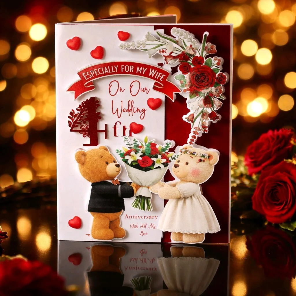 (NEW) Wedding Anniversary card.
Front (outside) Full-bleed 3D-effect images: two AI-generated teddy bears — holding a bouquet. Message on front reads, Especially for my wife on our wedding anniversary. With all my love. 
Envelope is supplied. The flo