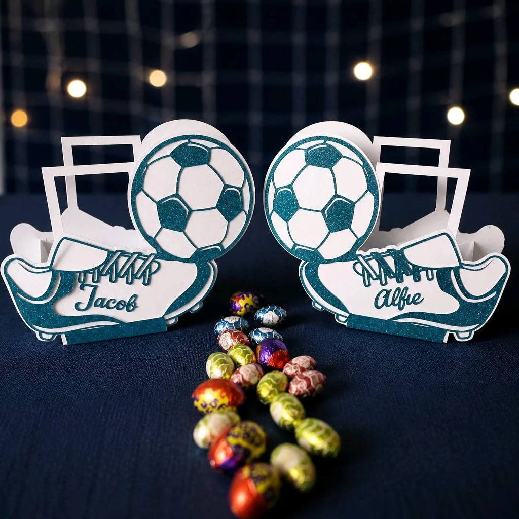 Football Boot Easter Gift Box! 
Cut in the shape of a football boot, this Easter box is perfect for little superstars. A large football shape is attached to the toe of the boot. The child's name can be fixed to the side for a personalised touch. Insi
