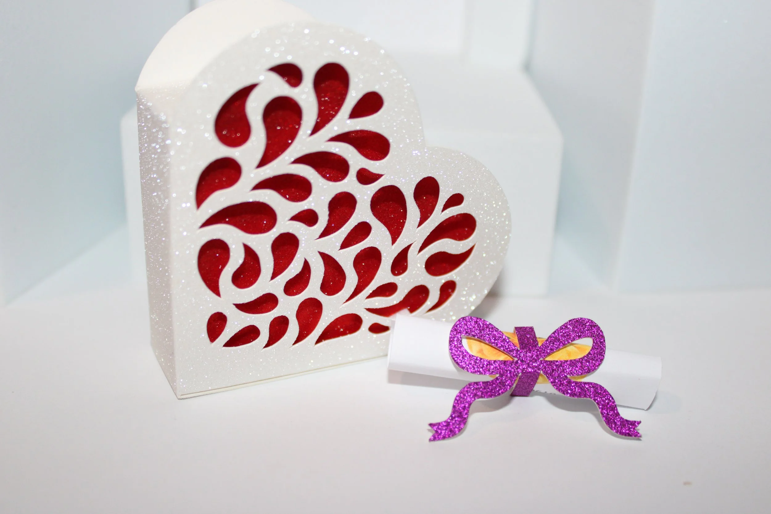 A stunning box cut with white/red glitter card.