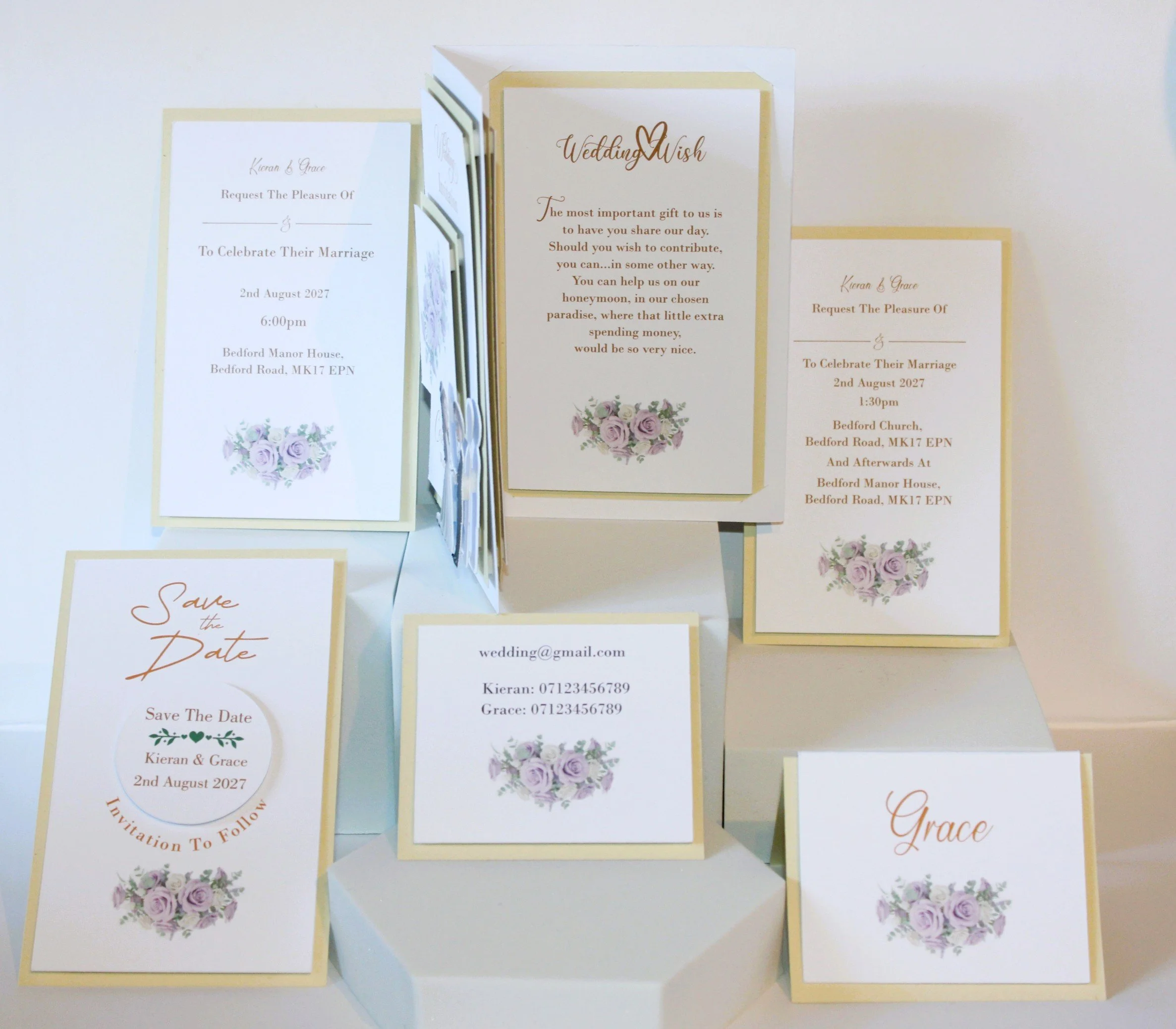 RSVP card: Pre-printed reply card.

Plus two co-ordinating place cards for the top table or guest seating, printed and placed on cream card to match the suite.