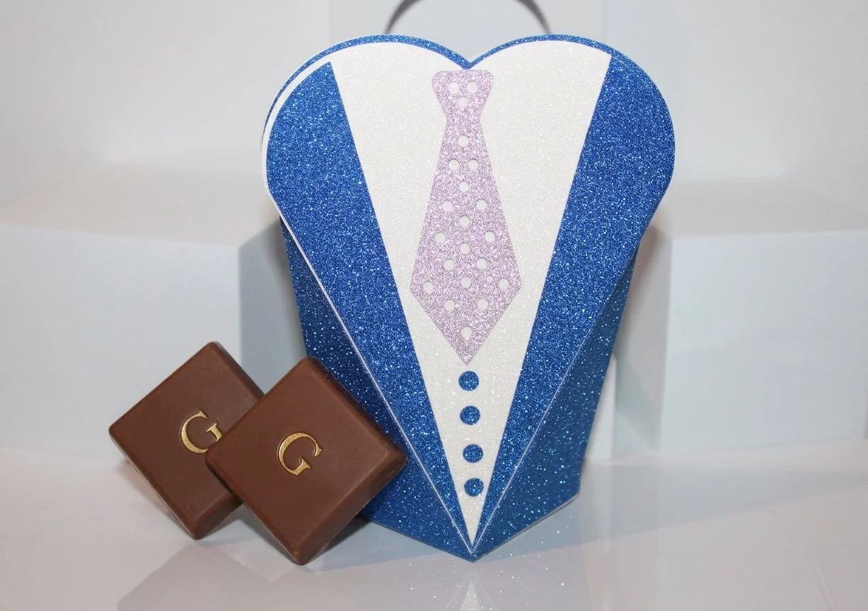 Large Tuxedo Favour Box!
Crafted with a stunning blue  card & cut into a tuxedo design, 

This will certainly bring a unique flair to your wedding day. Perfect for small chocolates. (Chocolates Not Included)  #0065