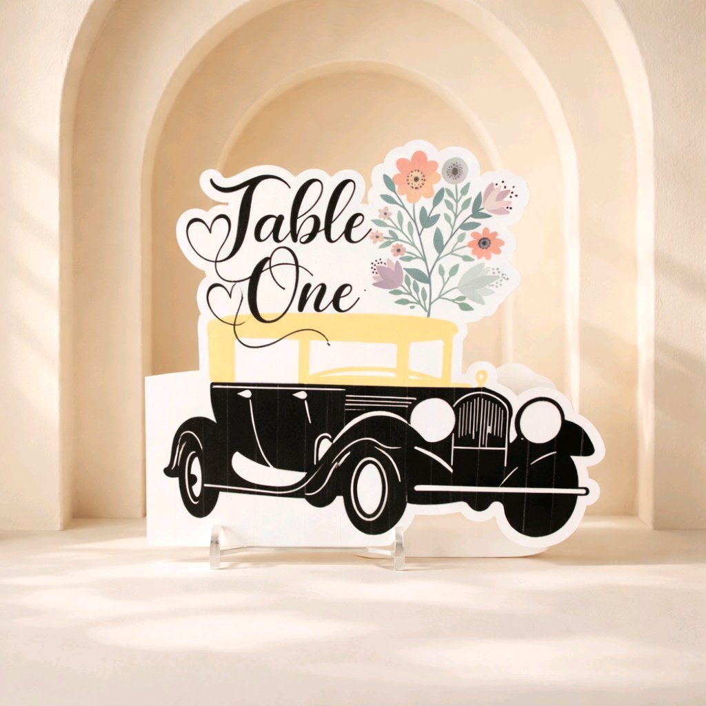 Vintage car & floral edge table number!

This gorgeous vintage car design has been beautifully extended off the edge, making it a unique piece. To complete the design, there is also an adorable offset bouquet attached  alongside the table number. The