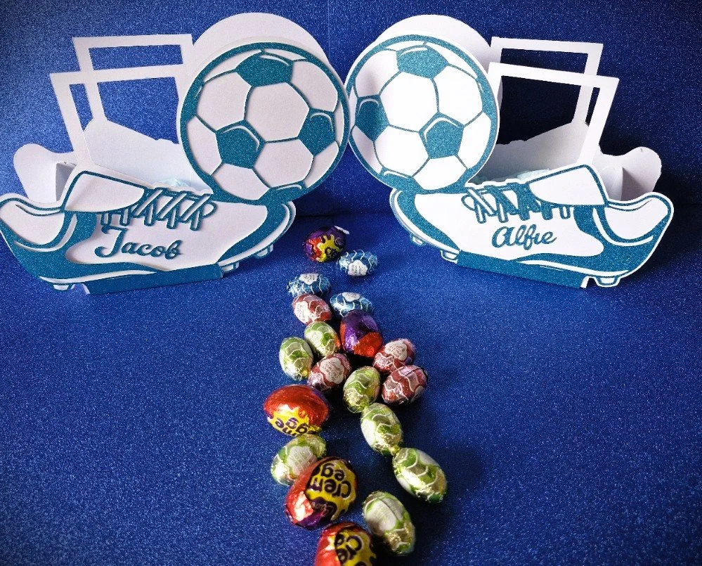 Easter Gift Box! 
Cut in the shape of a football boot, this Easter box is perfect for little superstars. A large football shape is attached to the toe of the boot.
#00180