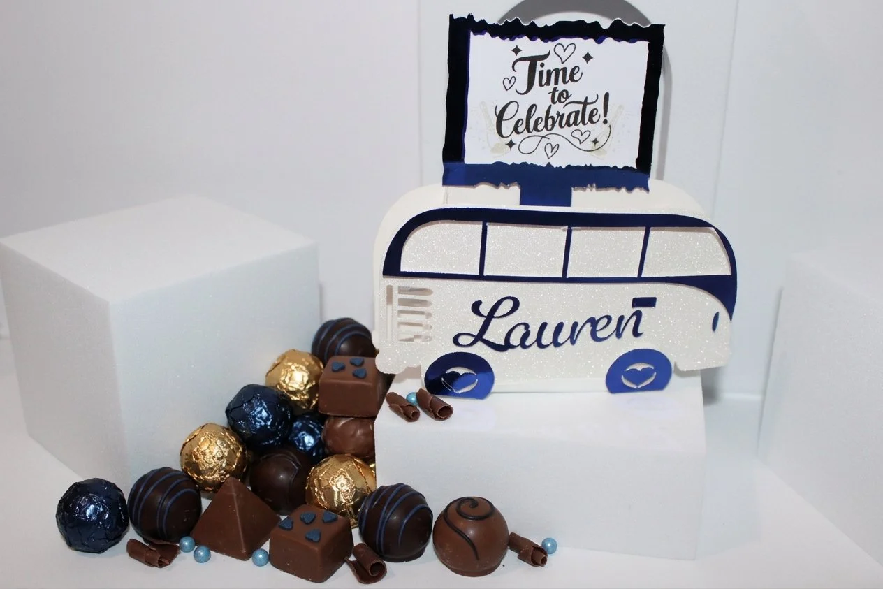 Blue metallic campervan favour box!
These gorgeous campervan favour boxes will have you captivated. 

They have been crafted in a shimmering white glitter card & finished in a stunning shiny blue metallic card. #0075