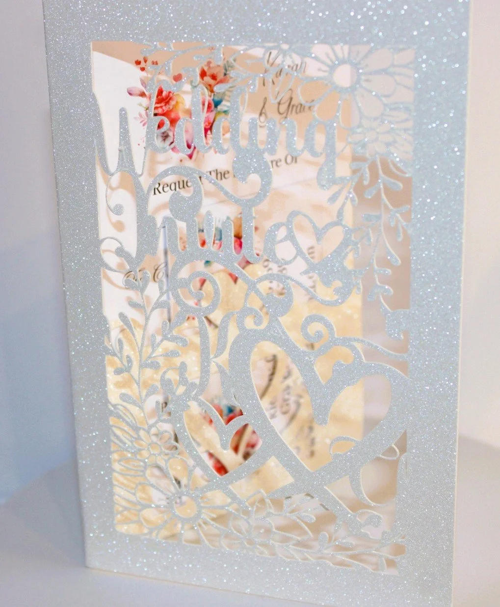 INTRICATELY CUT INVITATION PACKAGE!
Beautifully crafted with wedding invite gently pieced into the design. A delicate but stunning design. #006