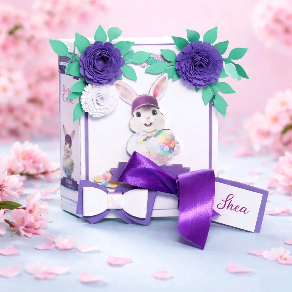 Easter Gift Box For Her! (Purple)
Easter gift box shaped like a book, handcrafted with care and charming details. The cover features an AI-generated bunny illustration, precision-cut and layered for a dimensional look.  #00472