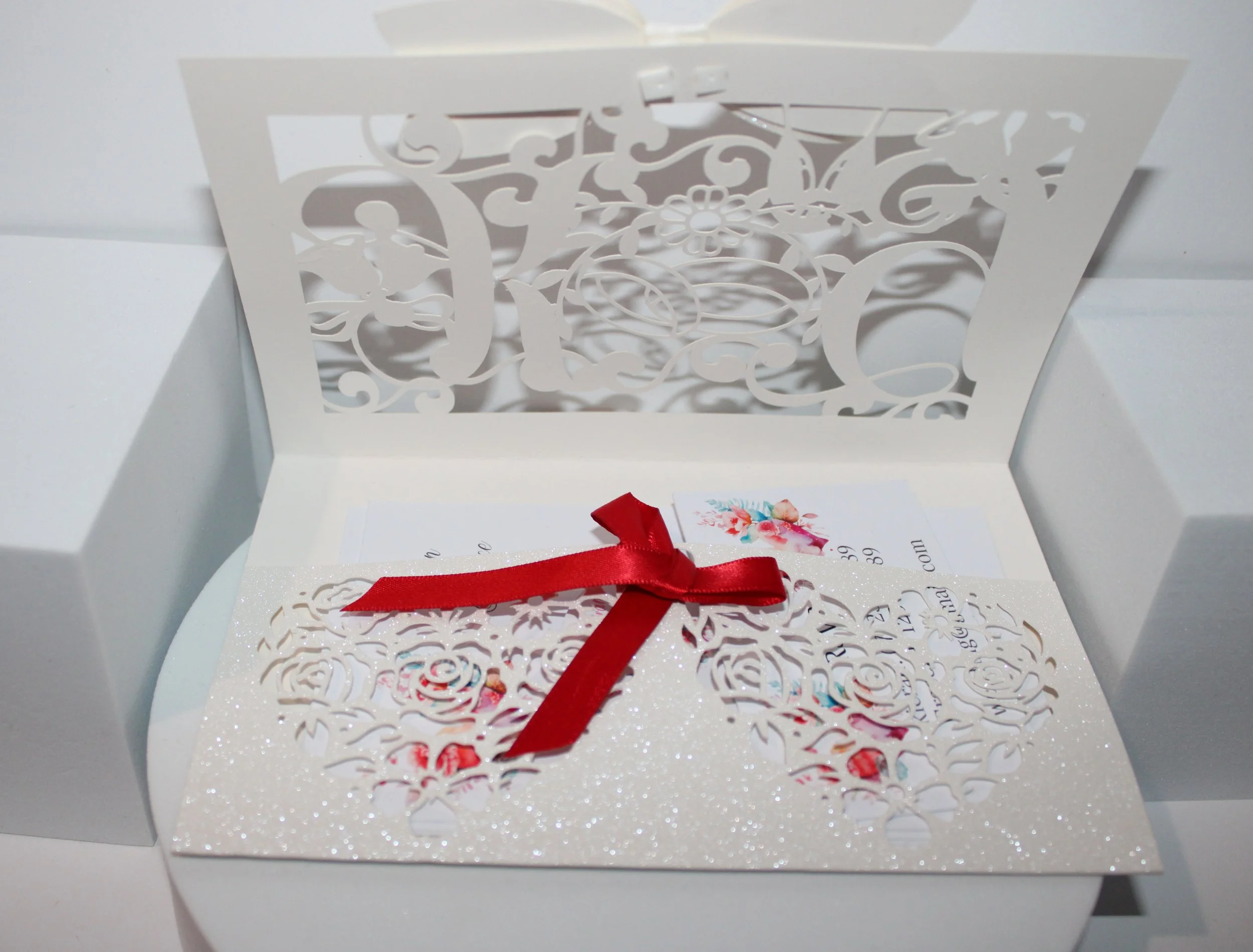 The inserts have also been beautifully crafted and printed to compliment the invitation carrier. Inside is a pouch to hold all of your information.