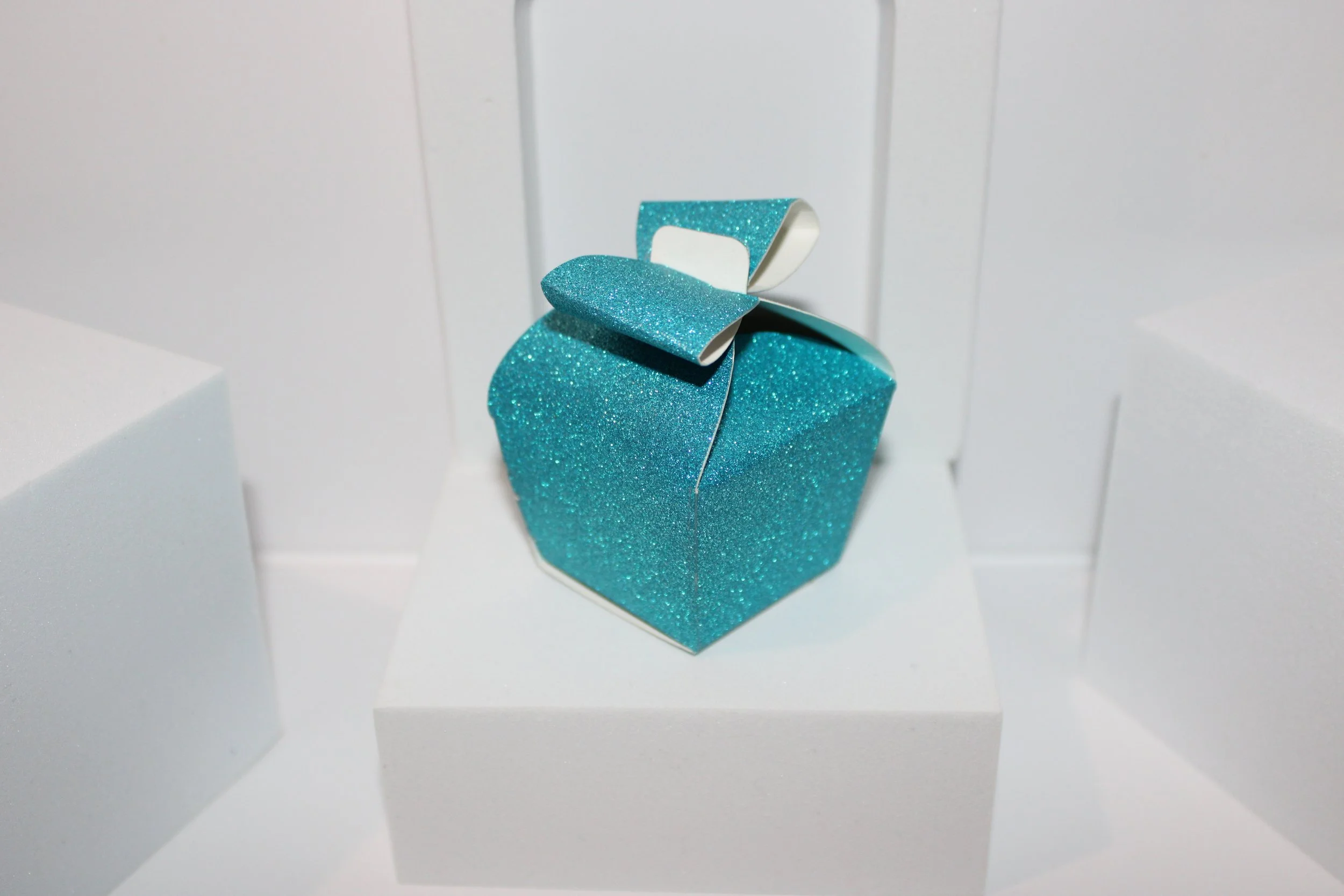 This gorgeous little box has been cut so when it closes it looks like a bow on the top.